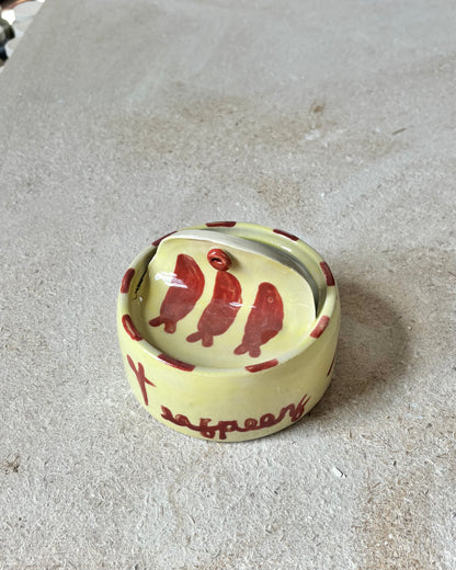 yellow and red sardine tin + spoons