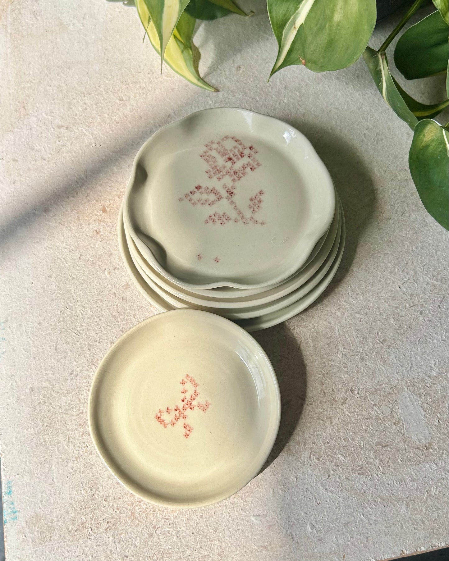 cross-stitch tea plates