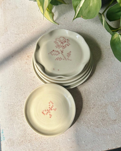 cross-stitch tea plates