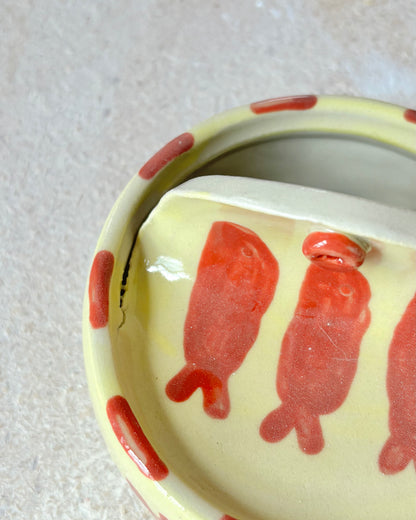 yellow and red sardine tin + spoons